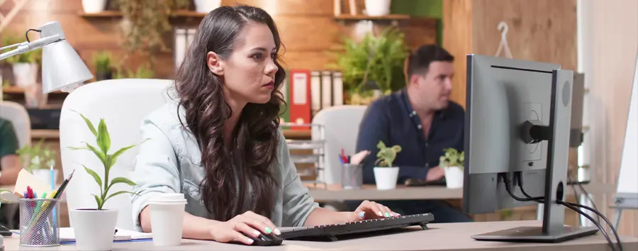 successful businesswoman sitting at desk table working